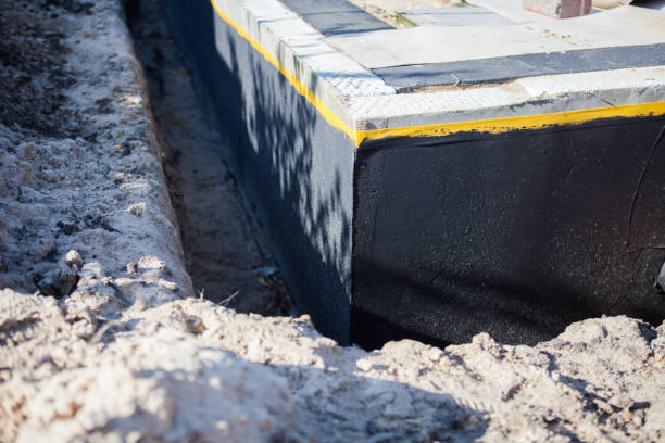 Professional Exterior Waterproofing technician working in Williamson, NY